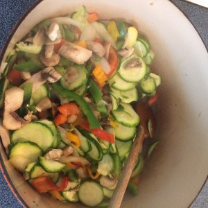 Onions, tri peppers, mushrooms, zucchini, and garlic.